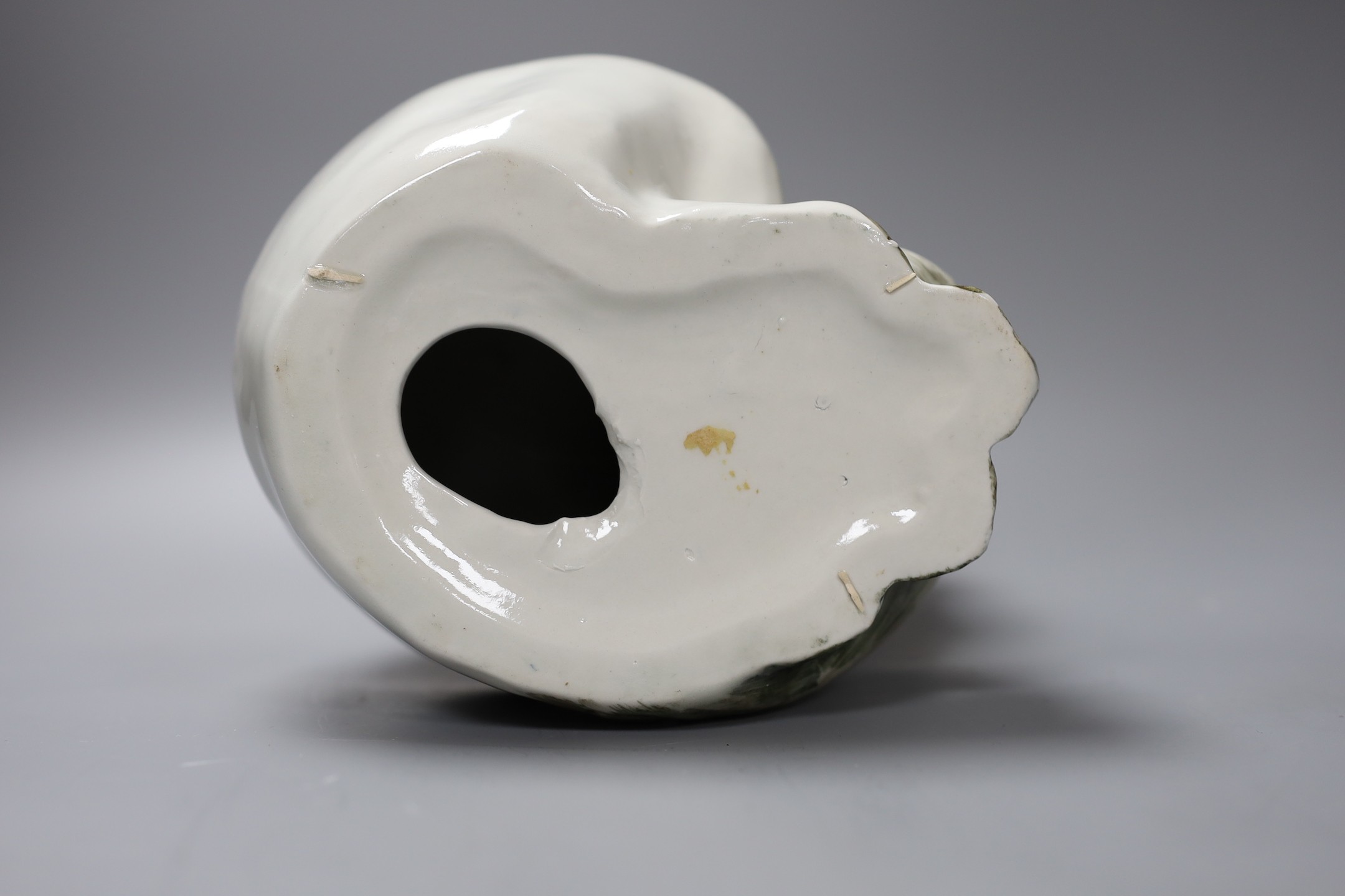 A Kensington ceramic lurking Siamese cat with blue glass eyes by Winstanley, together with another, tallest 26cm